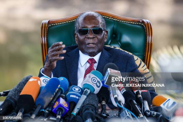 Former Zimbabwean President Robert Mugabe addresses media on July 29, 2018 during a surprise press conference at his residence "Blue Roof " in...