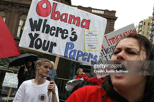 Members of the Tea Party movement protest outside of the Fairmont Hotel before U.S. President Barack Obama arrives for a fundraiser May 25, 2010 in...