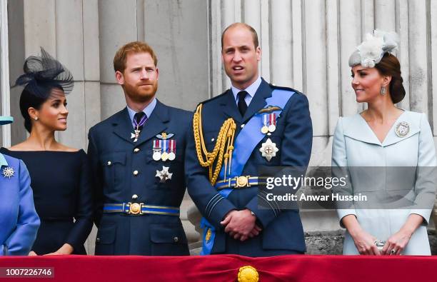 Meghan, Duchess of Sussex, Prince Harry, Duke of Sussex, Prince William, Duke of Cambridge and Catherine, Duchess of Cambridge stand on the balcony...