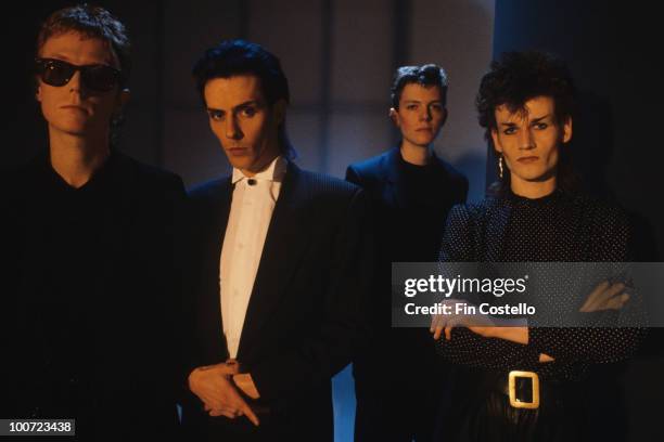 Posed group portrait of Bauhaus. Left to right are David J, Peter Murphy, Kevin Haskins and Daniel Ash in March 1982.