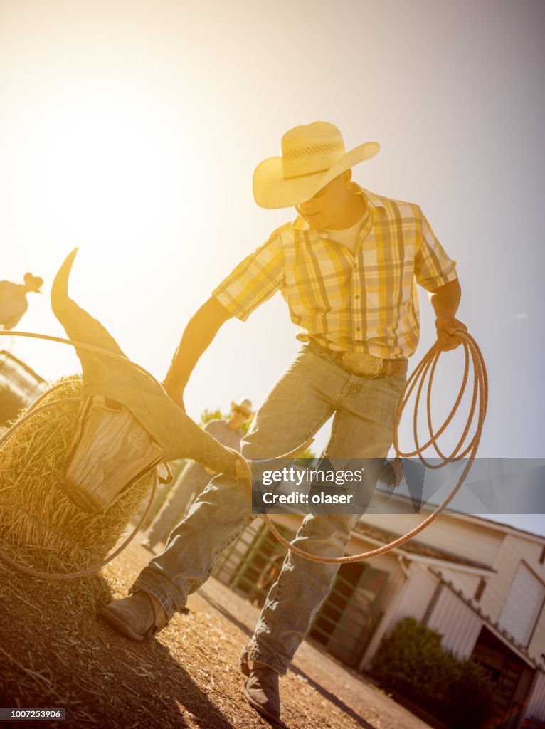 Young Cowboys Training Roping At Farm High-Res Stock Photo - Getty Images