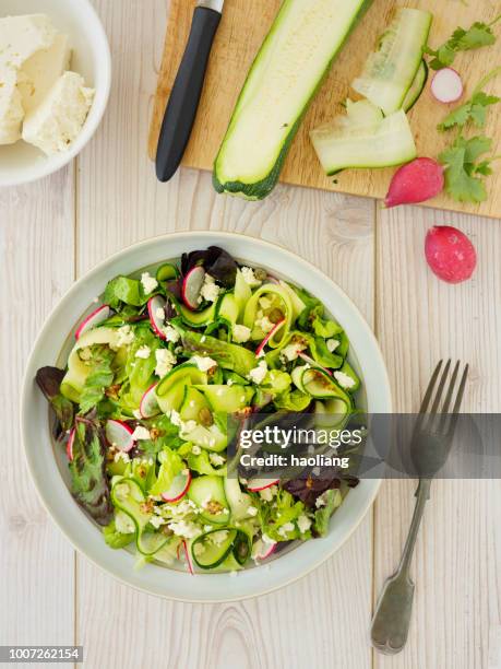 healthy summer courgette salad - radish vinaigrette stock pictures, royalty-free photos & images