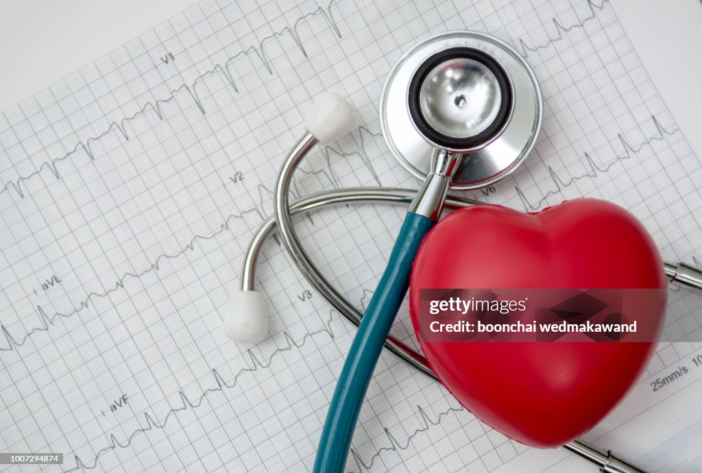 Heart ,stethoscope on cardiogram report of cardiology patient. Cardiologist and medical concept