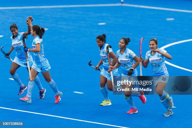 Rani of India celebrates with team mates after scoring her sides equalising goal to make the score 1-1 during the Pool B game between India and USA...