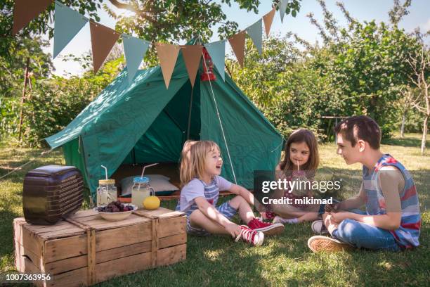 little friends having picnic - kids picnic stock pictures, royalty-free photos & images