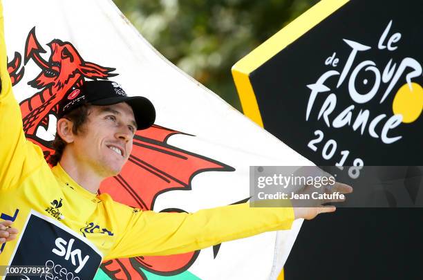 Winner of the Tour, yellow jersey Geraint Thomas of Great Britain and Team Sky during the final podium ceremony following stage 21 of Le Tour de...