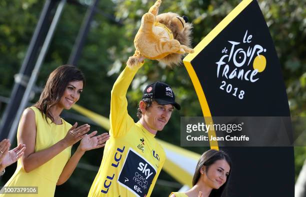 Winner of the Tour, yellow jersey Geraint Thomas of Great Britain and Team Sky during the final podium ceremony following stage 21 of Le Tour de...