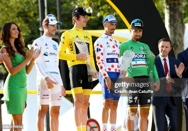 Pierre Latour of France and AG2R La Mondiale, winner of white jersey of best young rider, winner of the Tour yellow jersey Geraint Thomas of Great...