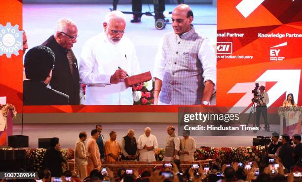 Prime Minister Narendra Modi, laying the foundation of several projects at a mega ground-breaking event in the presence of Uttar Pradesh Governor Ram...