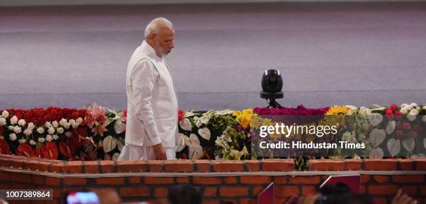 Prime Minister Narendra Modi, before laying the foundation of several projects at a mega ground-breaking event at Indira Gandhi Pratishthan, on July...