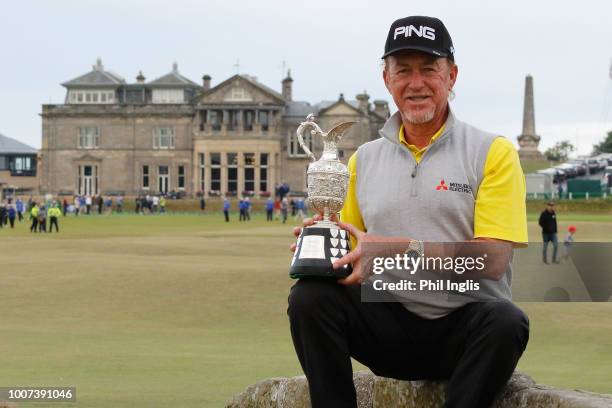 Miguel Angel Jimenez of Spain poses with the trophy after the final round of the Senior Open presented by Rolex played at The Old Course on July 29,...