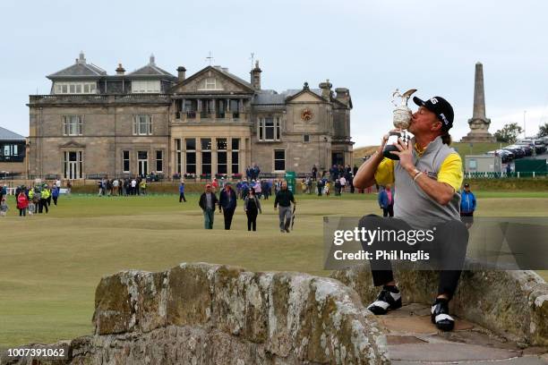 Miguel Angel Jimenez of Spain poses with the trophy after the final round of the Senior Open presented by Rolex played at The Old Course on July 29,...