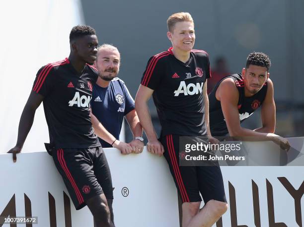 Axel Tuanzebe, Scott McTominay and Chris Smalling of Manchester United in action during a first team training session as part of their pre-season...