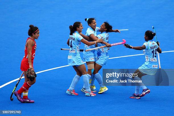 Rani of India celebrates scoreing her sides first goal with team mates during the FIH Womens Hockey World Cup Pool B game between India and the...