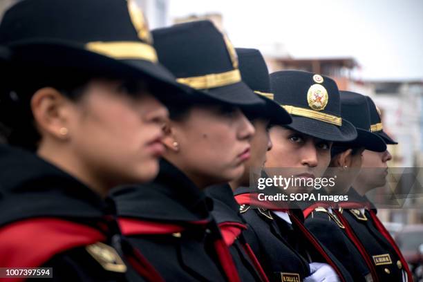 Women of Peru's Policia Nacional seen marching. Members of Peru's armed forces, coastguard, search & rescue, and police march in full uniform during...