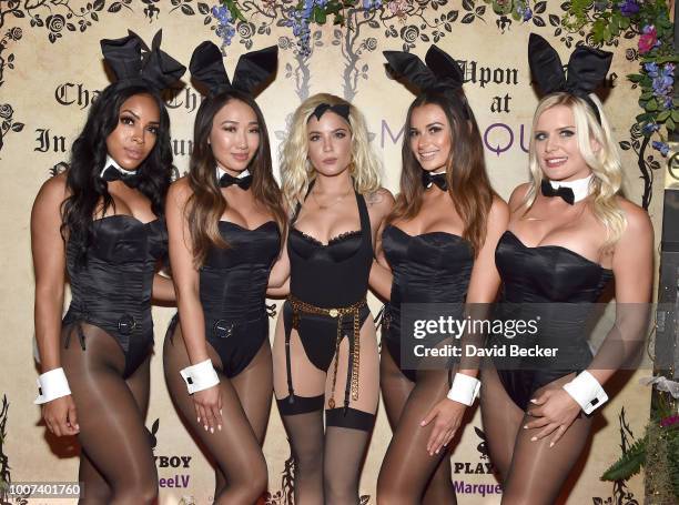 Singer Halsey poses with Playboy Bunnies at Playboy's Midsummer Night's Dream at the Marquee Nightclub at The Cosmopolitan of Las Vegas on July 28,...