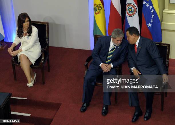 Argentine President Cristina Fernandez de Kirchner looks as Brazilian President Luiz Inacio Lula Da Silva and Venezuelan President Hugo Chavez chat...