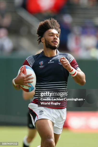 Max Denmark of Hong Kong runs away to score a try against Uruguay during day three of the Rugby World Cup Sevens at AT&T Park on July 22, 2018 in San...