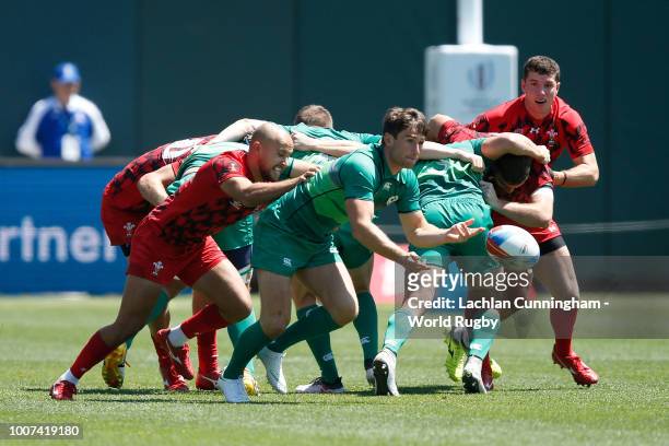 Billy Dardis of Ireland passes the ball against Wales during day three of the Rugby World Cup Sevens at AT&T Park on July 22, 2018 in San Francisco,...