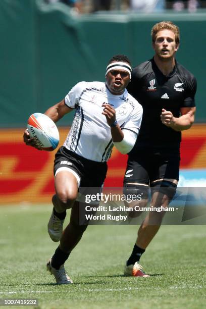 Amenoni Nasilasila of Fiji runs with the ball against New Zealand during the Championship semi final match on day three of the Rugby World Cup Sevens...