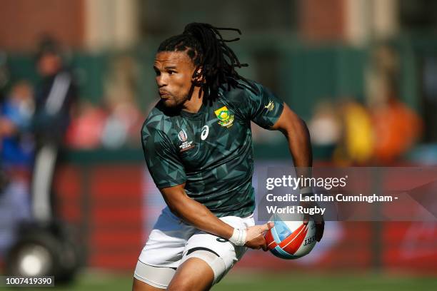 Rosko Specman of South Africa passes the ball against Fiji during day three of the Rugby World Cup Sevens at AT&T Park on July 22, 2018 in San...