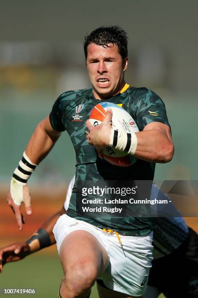 Ruhan Nel of South Africa runs with the ball against Fiji during day three of the Rugby World Cup Sevens at AT&T Park on July 22, 2018 in San...