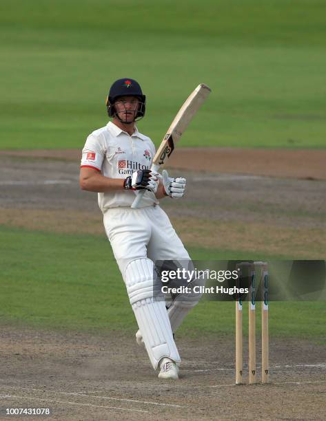 Jos Buttler of Lancashire bats during day two of the Specsavers County Championship division one match between Lancashire and Yorkshire at Emirates...