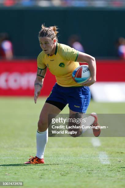 Raquel Kochhann of Brazil runs with the ball against Papua New Guinea during day two of the Rugby World Cup Sevens at AT&T Park on July 21, 2018 in...