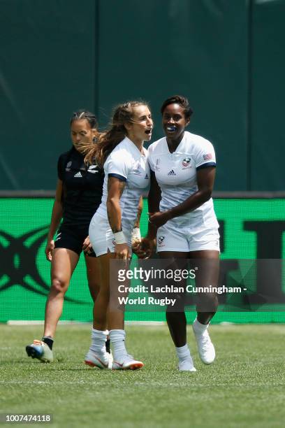 Naya Tapper of the United States celebrates with teammate Ryan Carlyle after scoring a try against New Zealand during day two of the Rugby World Cup...