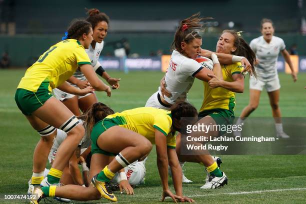 Abby Gustaitis of the United States attempts to cross the try line to score against Australia during day two of the Rugby World Cup Sevens at AT&T...