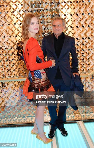 Natalia Vodianova and Patrick Demarchelier attend the launch of the Louis Vuitton Bond Street Maison on May 25, 2010 in London, England.