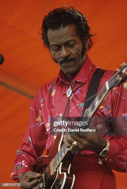 American singer, songwriter and guitarist Chuck Berry performs live on stage at the New Orleans Jazz and Heritage Festival in New Orleans, Louisiana,...