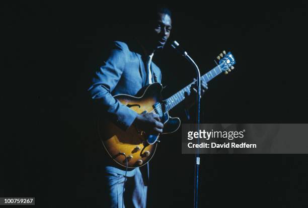 American singer, songwriter and guitarist Chuck Berry performs live on stage at Hammersmith Odeon in London in January 1965.