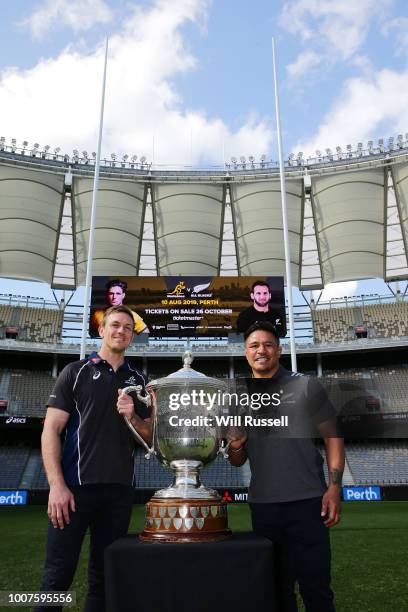 Qantas Wallaby, Dane Haylett-Petty and Classic All Black Keven Mealamu pose with the Bledisloe Cup after the 2019 Bledisloe Cup Media Announcement at...