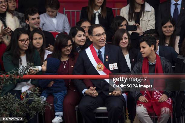 Peru's President Martin Vizcarra seen at the military parade. Members of Peru's armed forces, coastguard, search & rescue, and police march in full...