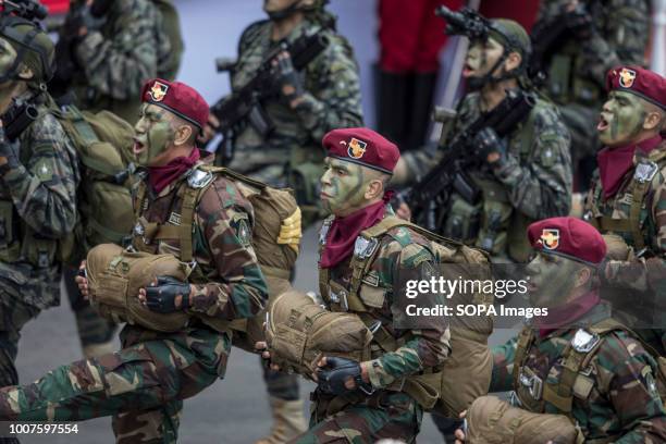 Peruvian officers seen participating in the military parade. Members of Peru's armed forces, coastguard, search & rescue, and police march in full...