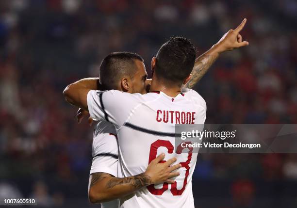 Suso and Patrick Cutrone of AC Milan celebrate Suso's goal in the first half during the International Champions Cup 2018 match against Manchester...