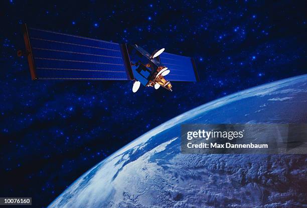 telecommunications satellite and earth - satellit stock-fotos und bilder