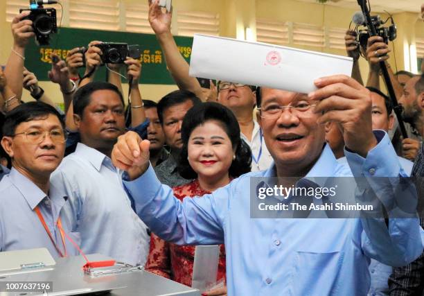 Cambodian Prime Minister and Cambodian People's Party President Hun Sen votes in the general election on July 29, 2018 in Phnom Penh, Cambodia. The...