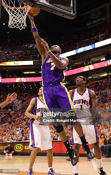 Lamar Odom of the Los Angeles Lakers takes a shot against the Phoenix Suns in the first quarter of Game Four of the Western Conference Finals during...