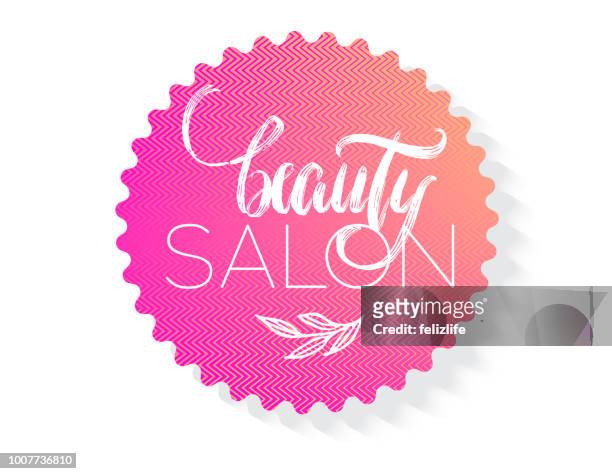 hand-drawing modern lettering "beauty salon" on neon background - hair salon stock illustrations