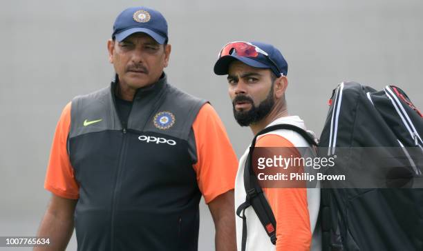 Ravi Shastri and Virat Kohli of India look on during a net session before the 1st Specsavers Test Match between England and India at Edgbaston on...