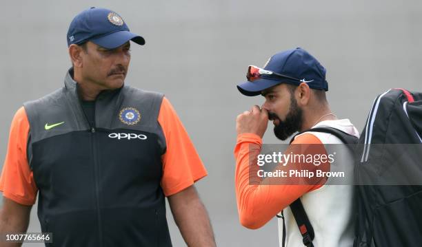 Ravi Shastri and Virat Kohli of India look on during a net session before the 1st Specsavers Test Match between England and India at Edgbaston on...