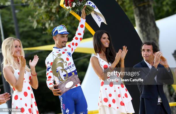 Julian Alaphilippe of France and Quick Step Floors, winner of polka dot jersey for best climber receives the trophy from CEO of Carrefour Alexandre...
