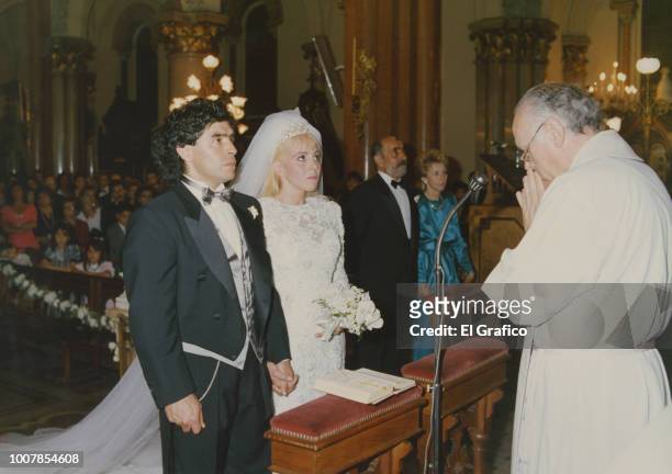 Diego Maradona and Claudia Villafañe stand in front of the altar during their wedding ceremony at Santisimo Sacramento Church on November 7, 2018 in...