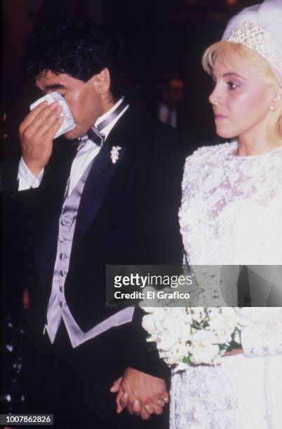 Diego Maradona cries next to Claudia Villafañe during their wedding at Luna Park Stadium on November 07, 1989 in Buenos Aires, Argentina.