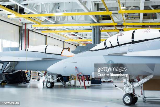Boeing Co. F/A-18 Super Hornet fighter jets sit at the Boeing Defense, Space & Security facility in St. Louis, Missouri, U.S., on Monday, July 24,...