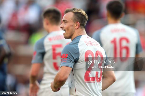 Xherdan Shaqiri of Liverpool celebrates after making a goal during an International Champions Cup match between Manchester United and Liverpool at...