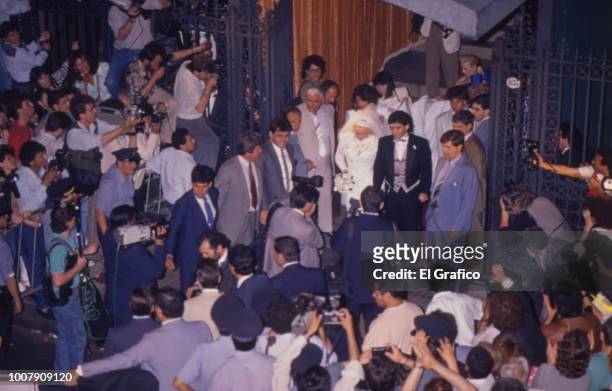 Diego Maradona and Claudia Villafañe walk out of the church after their wedding at Santisimo Sacramento Church on November 07, 1989 in Buenos Aires,...