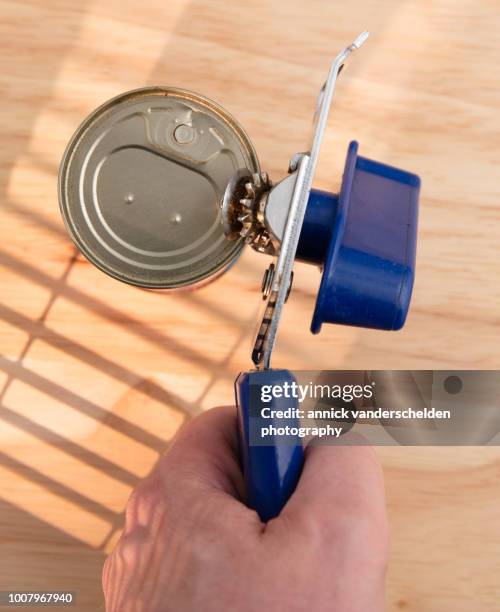 food can and can opener. - can opener stock pictures, royalty-free photos & images